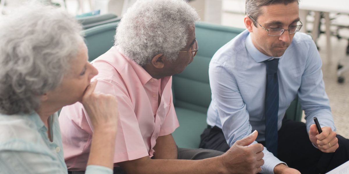 A client consults with a financial advisor to discuss wealth management strategies for their property investments.