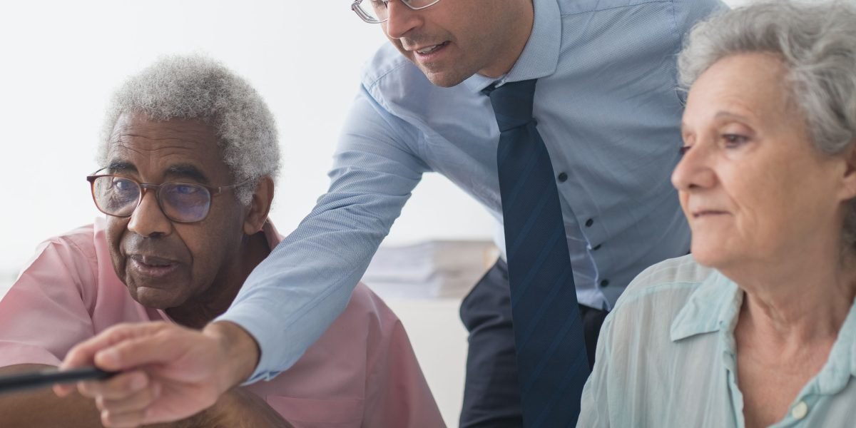 An individual thoughtfully reviewing documents, symbolizing the search for expert financial guidance in complex markets.
