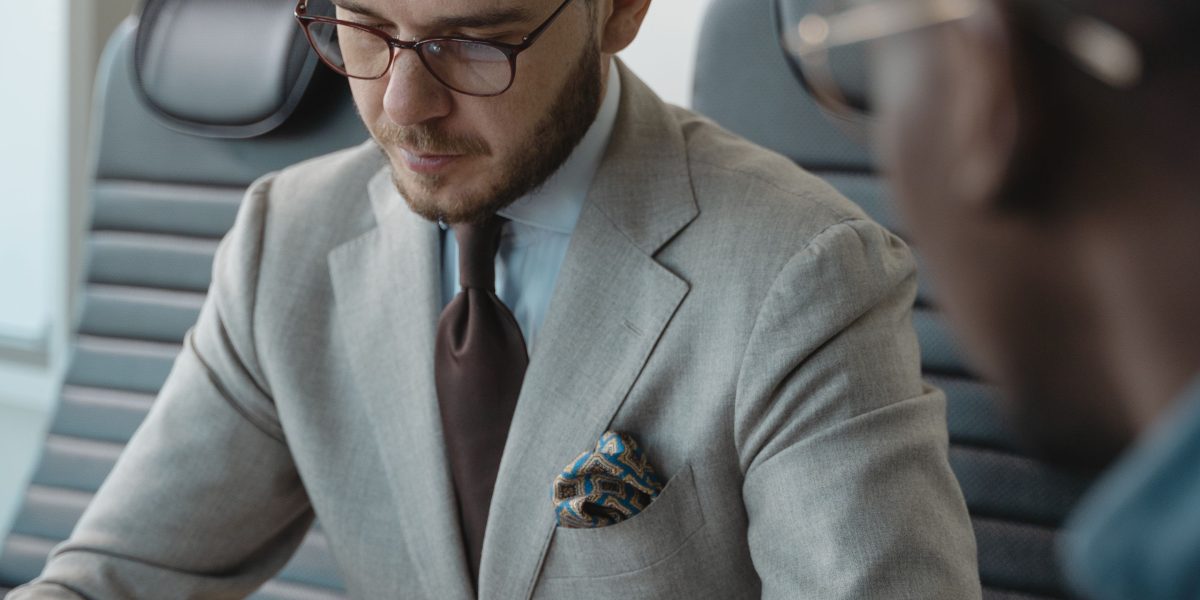 An investor making a confident and informed decision after receiving expert financial consultation.