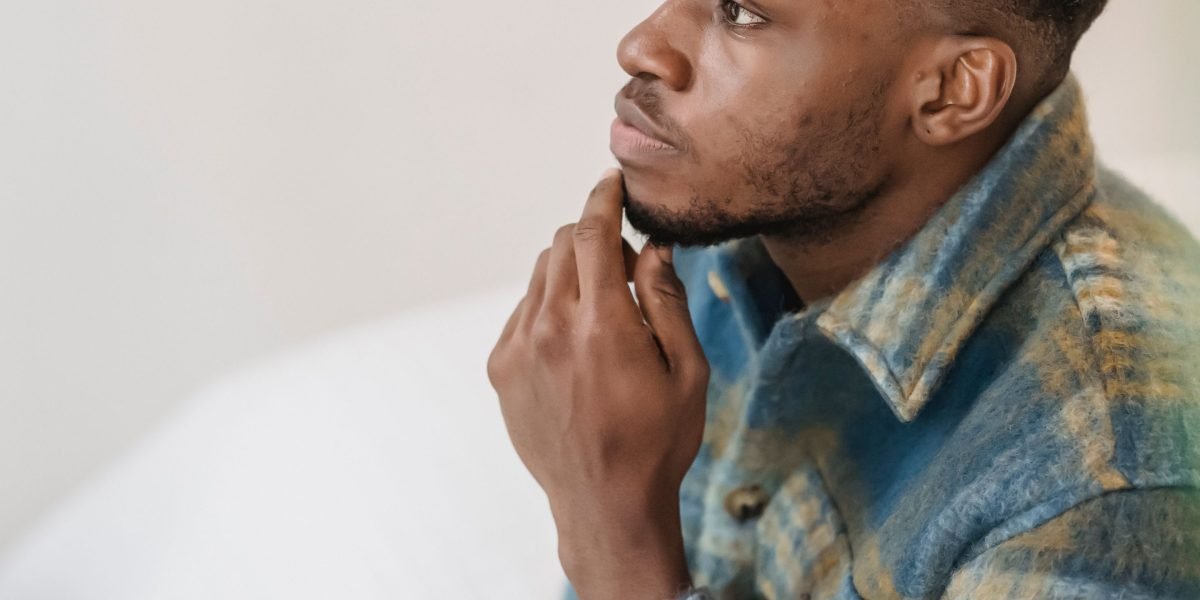 An investor thoughtfully analyzing information to make a well-informed decision.