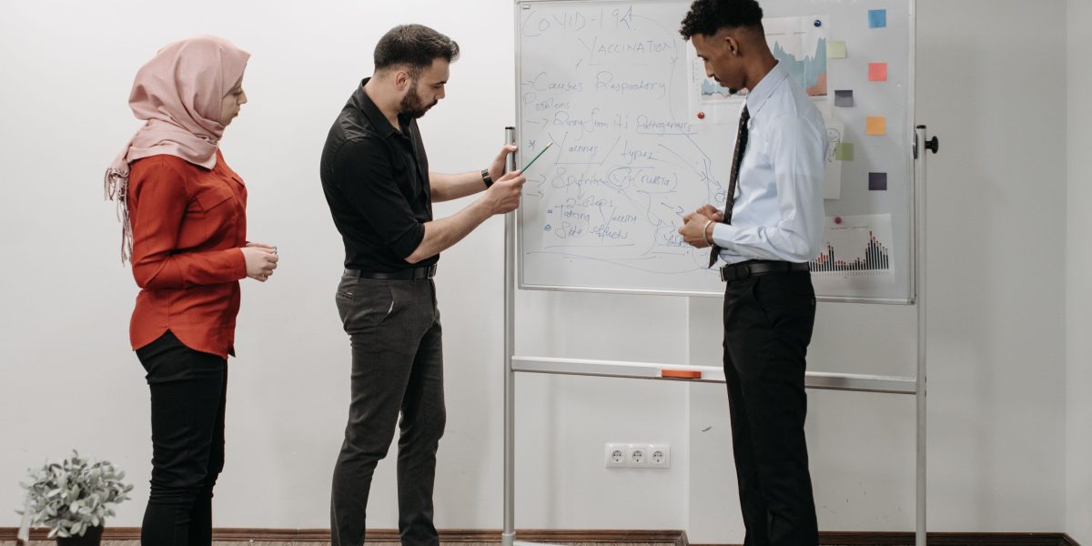 A team collaborating to develop and refine long-term investment strategies.