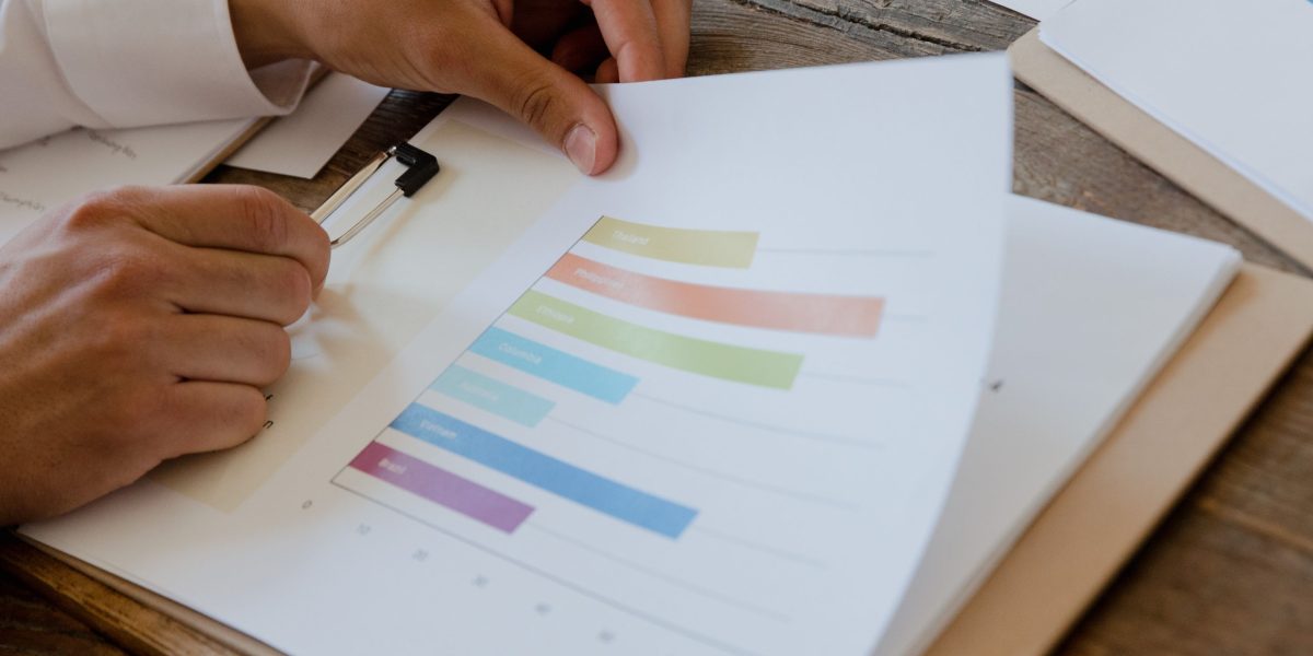 A professional presenting financial reports, highlighting transparency and governance in property management.