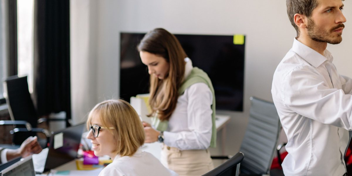 A team collaborating to identify and strategize potential risks in an investment plan, ensuring robust decision-making.